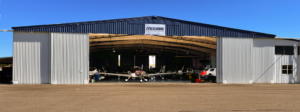 Hangar with doors open, from the flight line