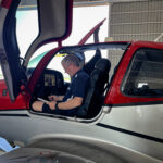 Steve in Cirrus cockpit doing annual